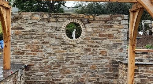 circular window in pergola end wall